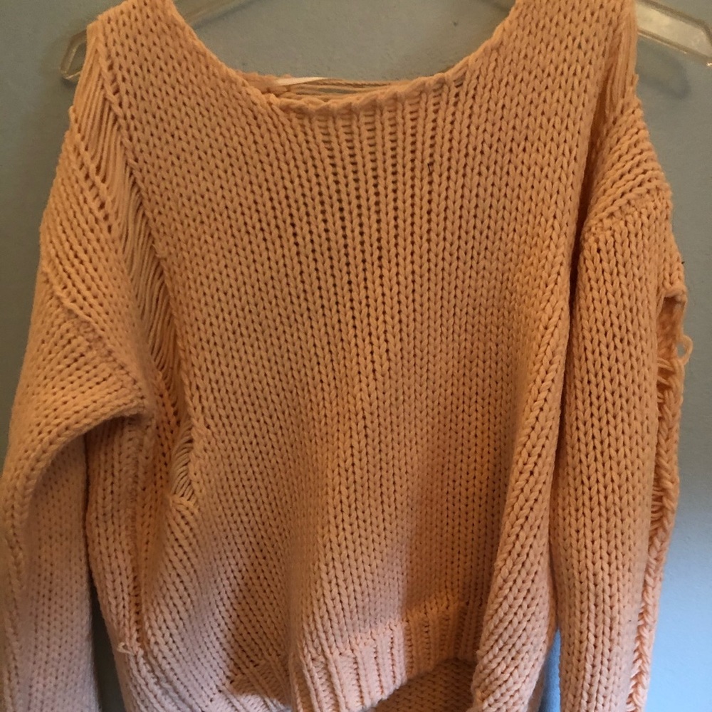 Distressed sweater